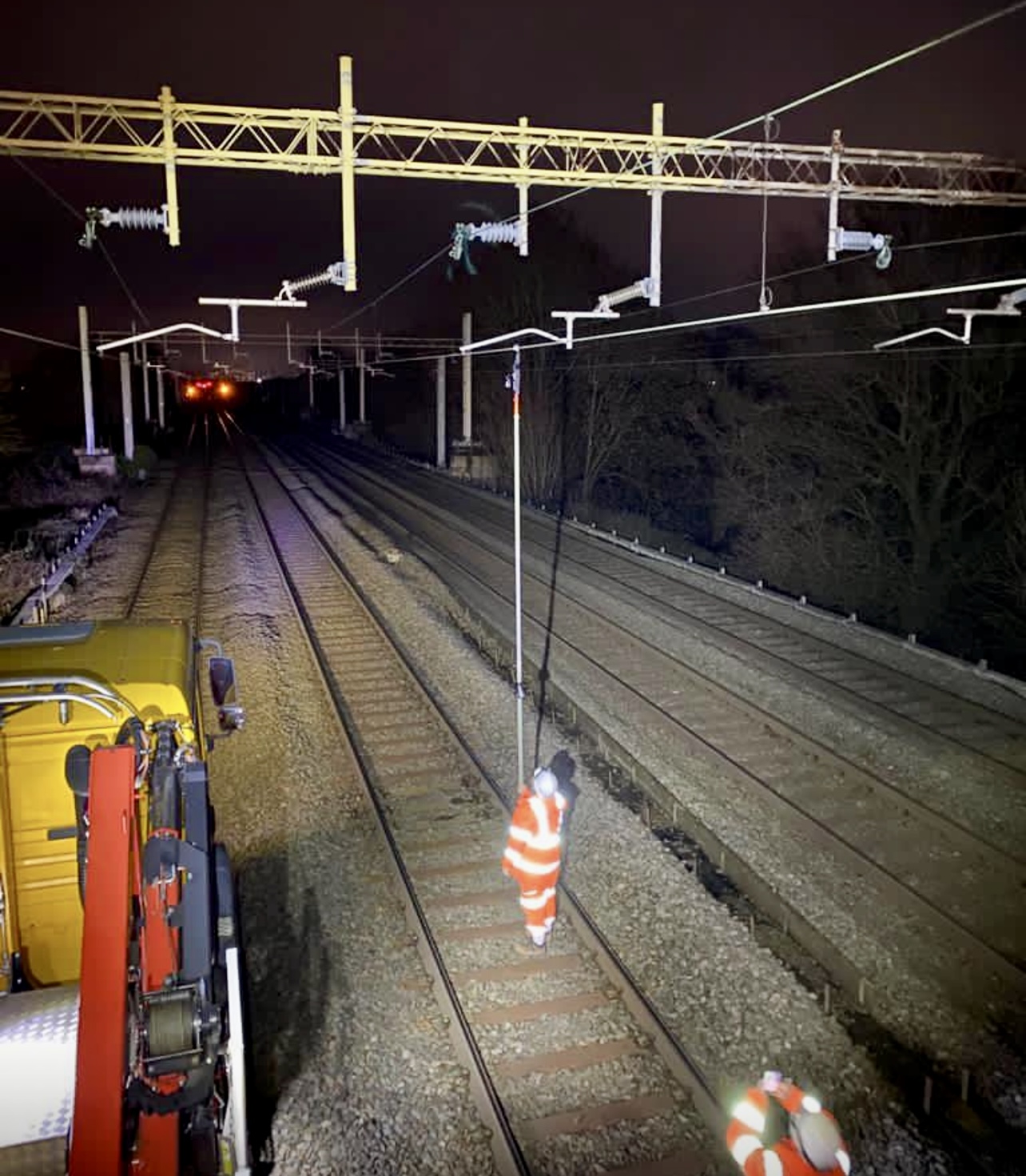 Mainline overhead line equipment at night